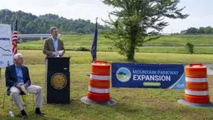 Beshear father and son at ribbon-cutting for Mountain Parkway Expansion