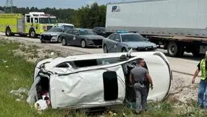 Trooper helps rescue family after rollover crash