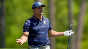 Bryson DeChambeau drills patron with tee shot, can't escape bunker in rough first round of the Masters