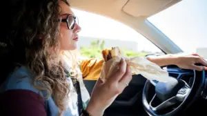 More Americans now eat in their cars than ever before as expert reveals what it says about modern life
