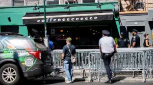 Protesters gather outside coffee shop that banned Jewish congressman over Israel support