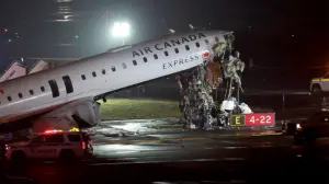 Air Canada jet hits fire truck, killing 2 and forcing New York's LaGuardia airport to close