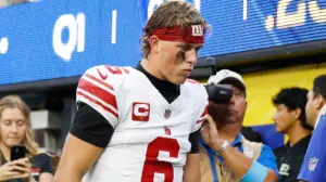 Giants' Jaxson Dart tried to reenter game with knee injury but had jersey taken away: reports