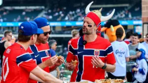 Norwegian World Cup fans turn Citi Field bleachers into a Viking longship during Mets game