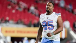 Titans player Jordan Elliott got angry at teammate, went to his car for a gun and ended up unemployed