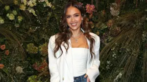 Jessica Alba stuns in red corset and lace mini dress as she celebrates her 45th birthday