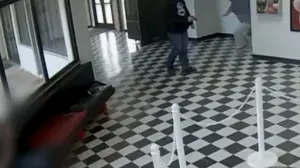 Hero principal takes a bullet to stop alleged planned school massacre