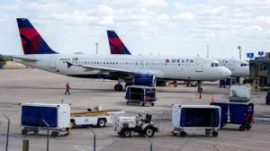 Flight passenger yells, 'I want off,' calls crew 'idiots' and yanks open emergency exit door