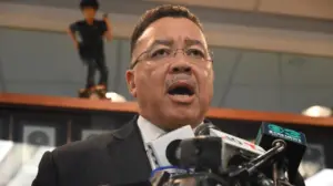 Philadelphia police officers shot 15 times combined in ambush attack, suspect found hiding in tree