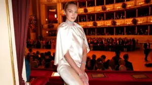 Victoria's Secret model Candice Swanepoel strips down to just swimsuit bottoms in sultry new clip