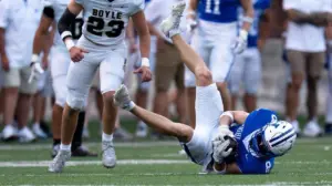 Behemoth high school football star slams defender to the ground like a ragdoll after interception