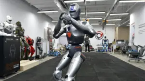 China's compact humanoid robot shows off balance and flips