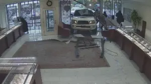 Washington jewelry store owner opens fire after would-be thieves ram truck through storefront