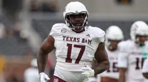 Albert Regis' baby daughter crawled toward a Jaguars cup before he was drafted by Jacksonville