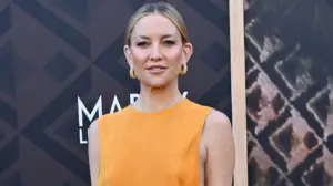Kate Hudson turns heads in bold yellow dress with revealing cutouts while on the red carpet