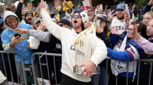 Brewers' World Series celebration gets rowdy as star makes outrageous beer promise, coach sings karaoke