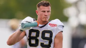 Pat McAfee endorses Saints' rookie wide receiver for WWE shot after training camp brawl