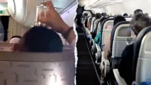 Passenger's bizarre use of drinking glass on flight leaves travelers horrified