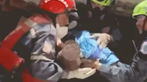 American rescue teams pull infant alive from rubble in Venezuela days after devastating twin earthquakes