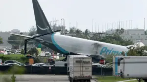 Amazon cargo plane overruns Miami airport runway and strikes 'multiple' vehicles; 5 dead, 5 injured