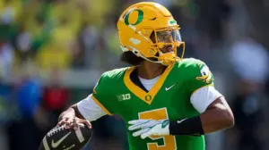 Dante Moore’s availability in serious doubt as Oregon takes a cautious approach with injured quarterback