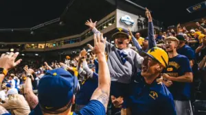 West Virginia's epic walk-off sparks emotional 'Country Roads' celebration that defines college sports