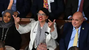 'Squad' member wears 'F--- ICE' pin on House floor during Trump address